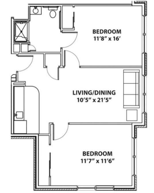 Floor plan of an apartment with two bedrooms and a combined living/dining space.
