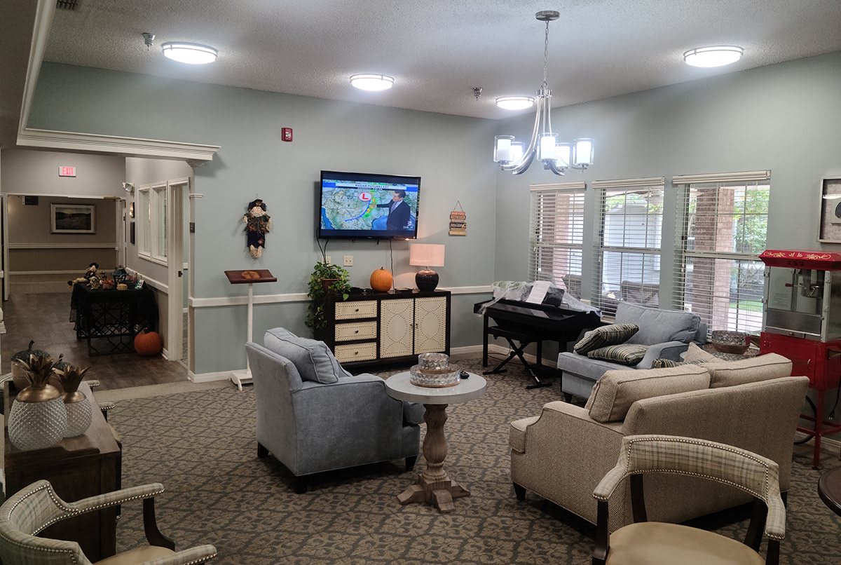 A cozy living room with comfortable seating and a television.