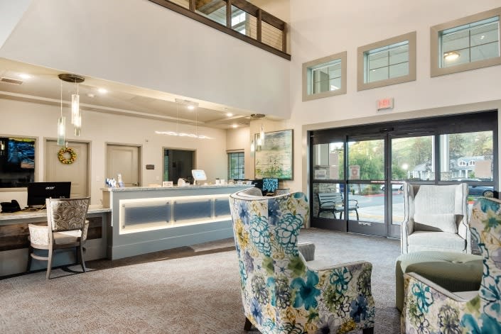 A modern reception area with comfortable seating and stylish decor.
