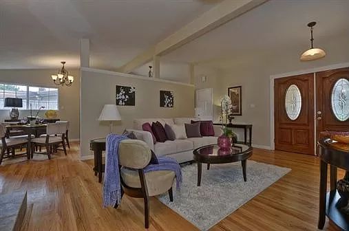 A cozy living room with stylish furniture and elegant decor.