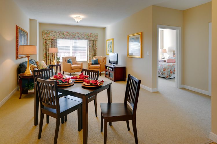 A cozy living and dining area in a modern apartment.