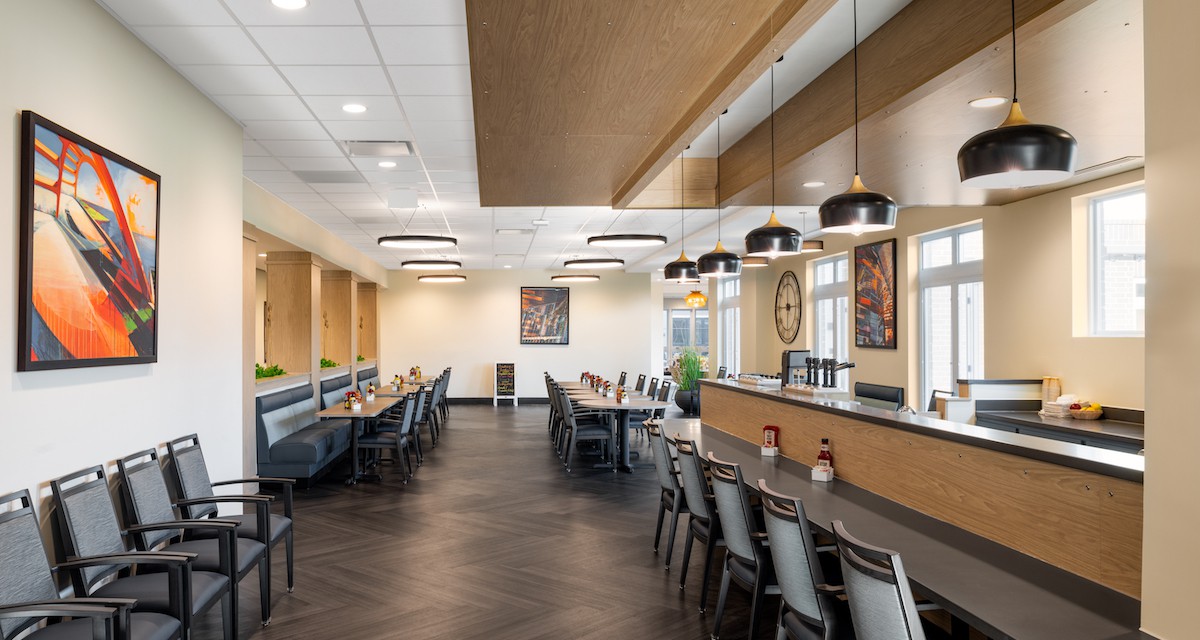 A modern restaurant interior featuring sleek seating and contemporary lighting.