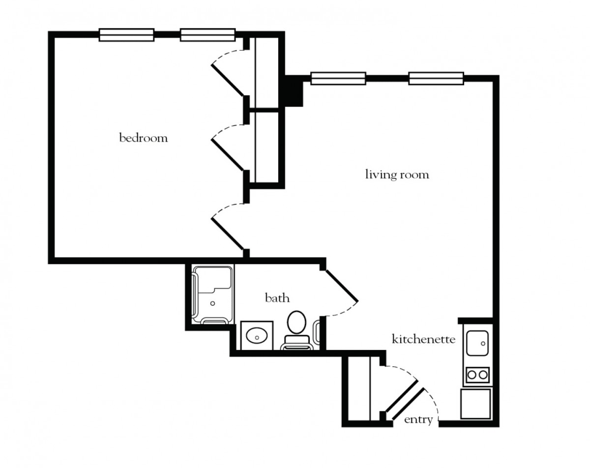 A floor plan of a one-bedroom apartment featuring a living room, bathroom, laundry area, and kitchen.