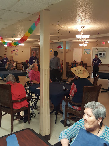 Residents enjoying an event at a community center.