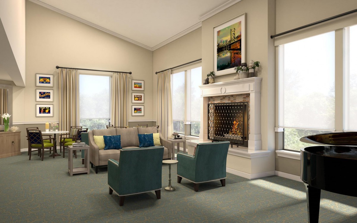 A cozy living room with elegant furniture and a warm fireplace.