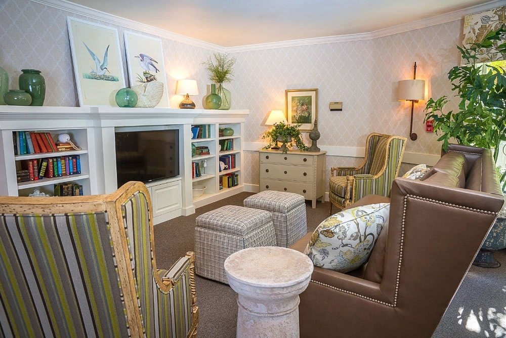 A cozy living room with elegant furniture and a bright, inviting atmosphere.