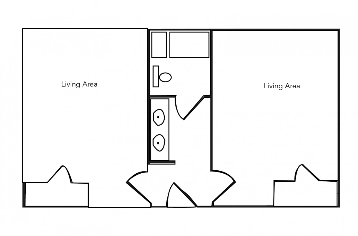 A floor plan featuring a bathroom between two living areas.