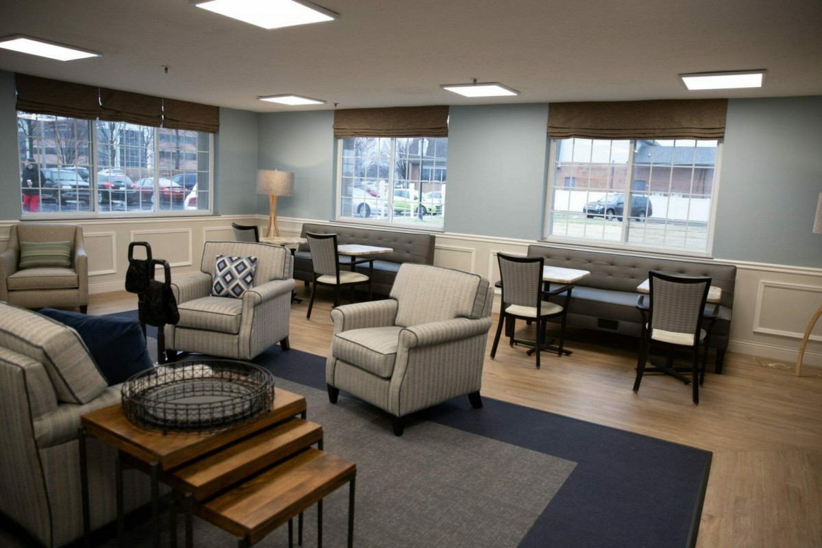 A cozy living room with comfortable seating and natural lighting.