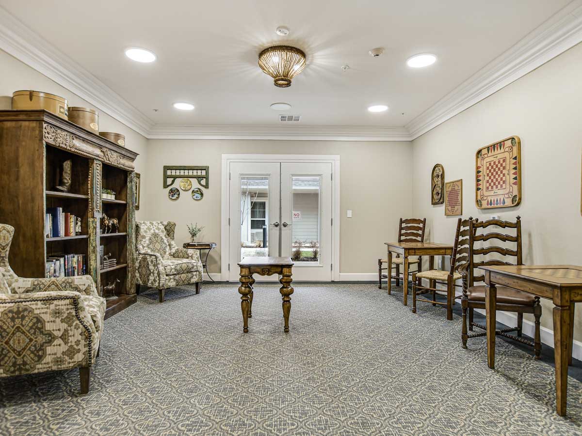 A cozy living room with traditional furniture and decor.