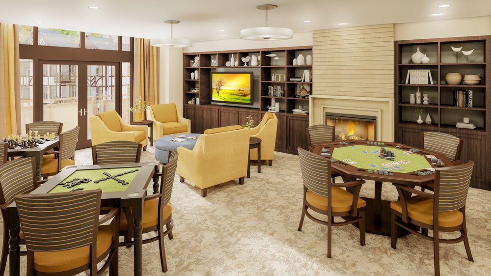 A cozy living room with comfortable seating, a fireplace, and a television, featuring warm tones and elegant decor.