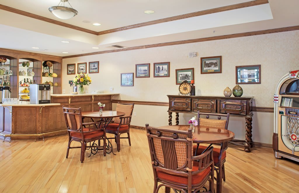 A cozy dining area with wooden furniture and decor.