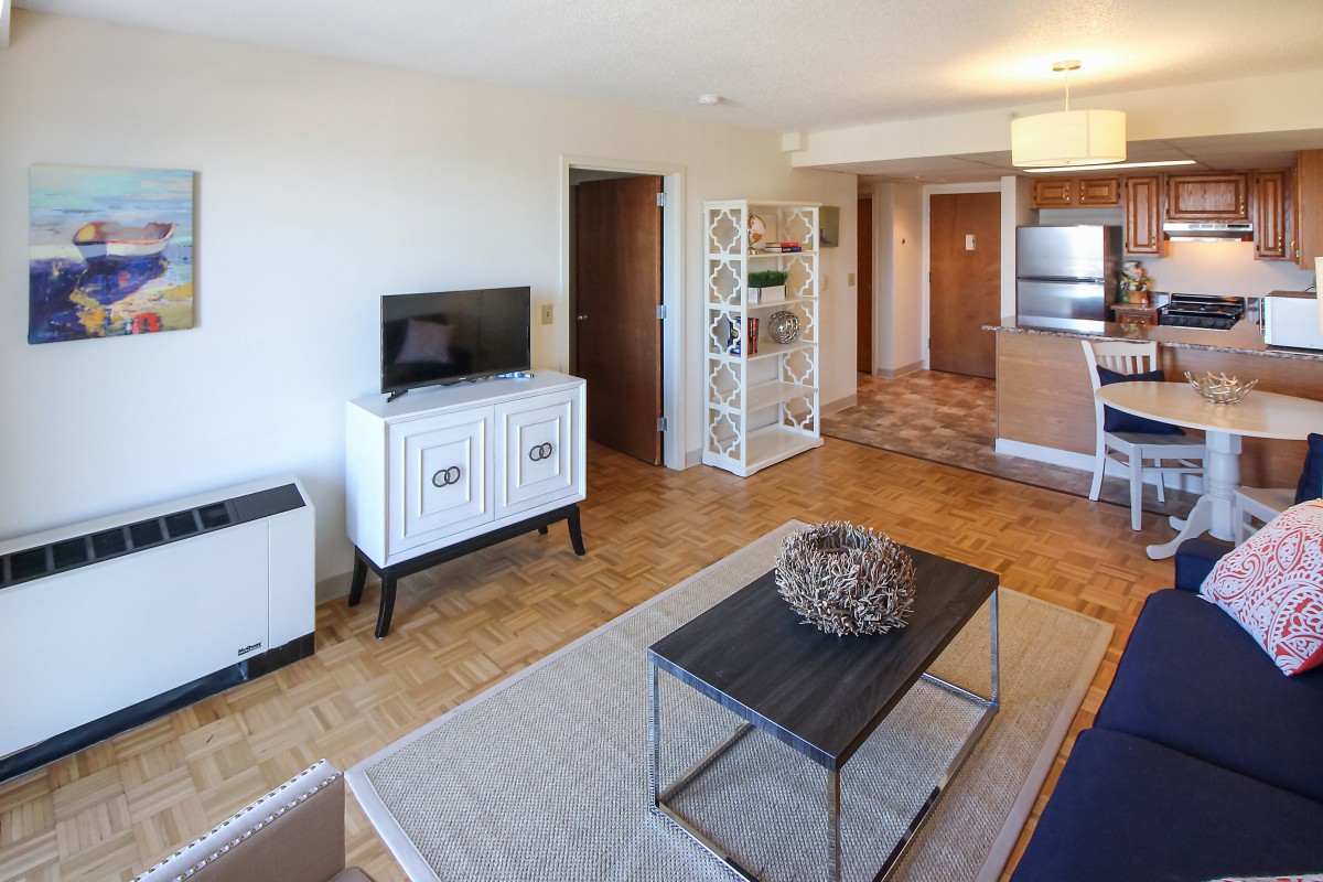 A modern living room with stylish furniture and a cozy atmosphere.