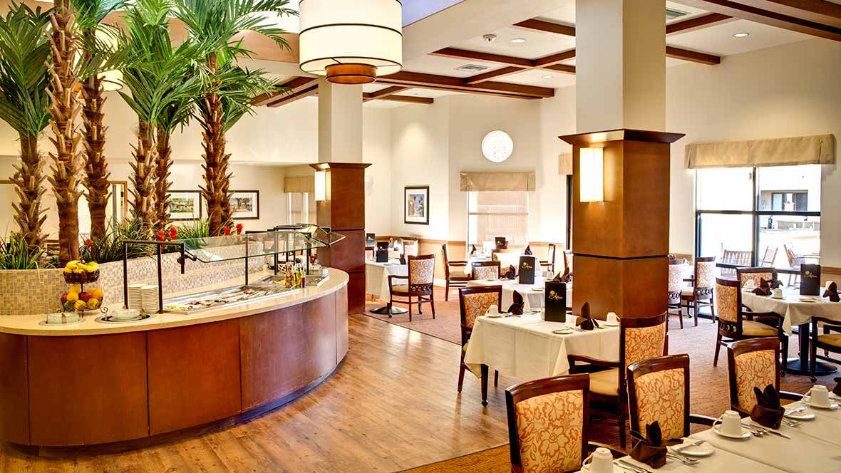 A stylish restaurant dining area with elegant decor and comfortable seating.