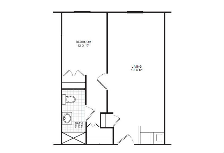 Floor plan of a one-bedroom apartment with bathroom, kitchen, and living area.