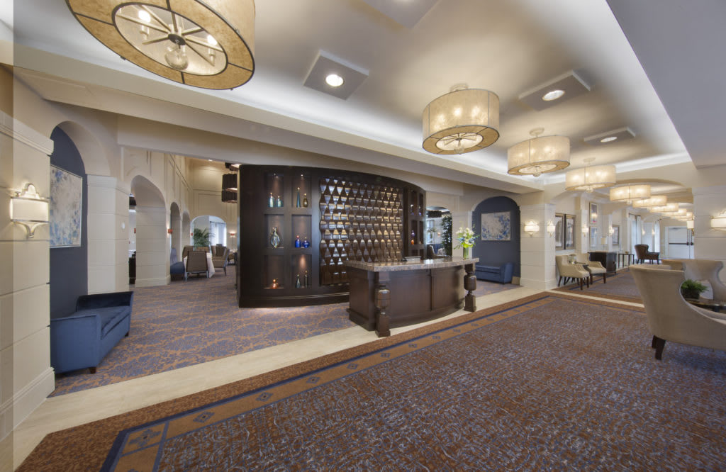 Luxurious hotel lobby with elegant lighting and modern design.