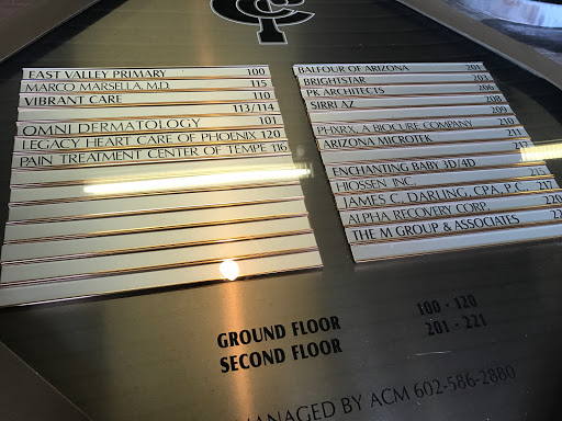 A directory sign showing office locations on the ground and second floors.