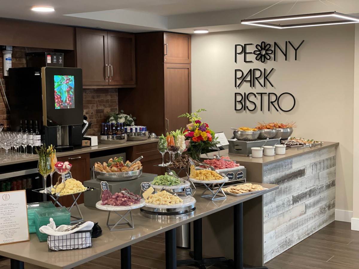 A well-arranged buffet at Penny Bark Bistro featuring a variety of food and drinks.