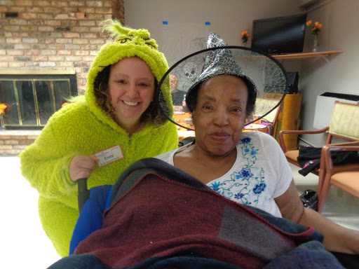 Two friends enjoying a playful moment in fun costumes.