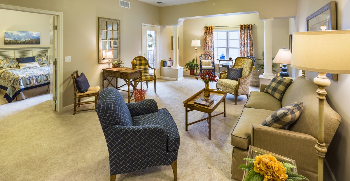 A cozy living room with traditional furniture and soft lighting.