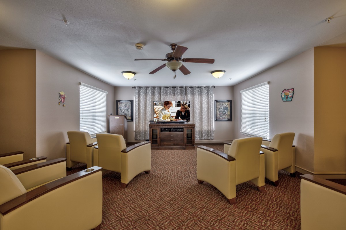 A cozy living area with comfortable seating and a television.