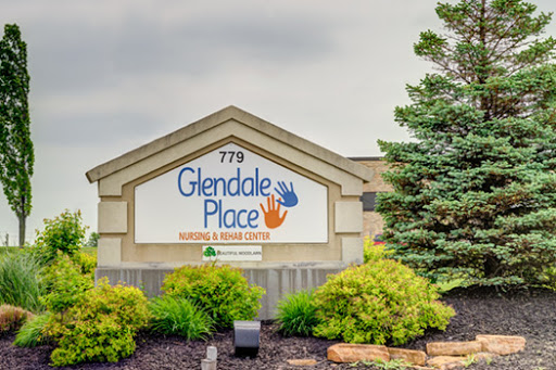 The entrance signage of Glendale Place Nursing and Rehab Center, surrounded by neatly trimmed shrubs.