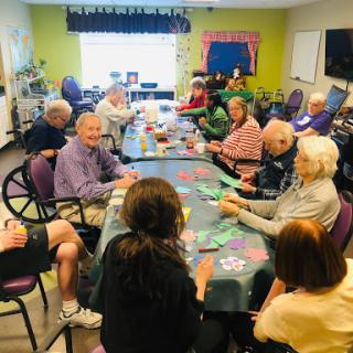 Seniors enjoying a game day at their community center.