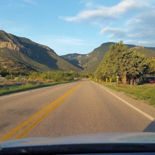 A scenic drive through the mountains on a clear day.