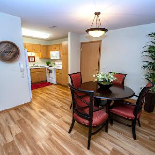 Cozy dining area with a modern kitchen in an inviting space.