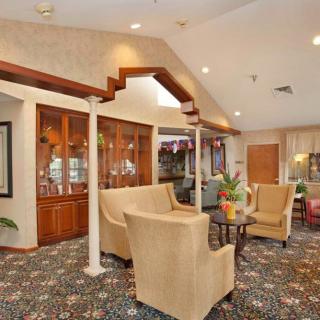 A well-appointed lobby interior featuring comfortable seating and elegant decor.