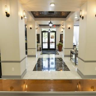 Elegant lobby with bright lighting and modern decor.