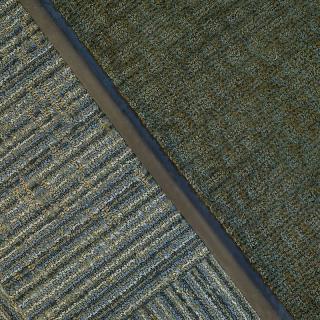 Aerial view of agricultural fields showcasing distinct patterns and textures.