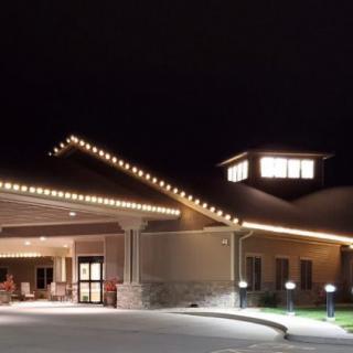 A well-lit building entrance at night