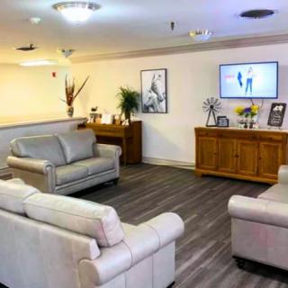 A cozy living room with comfortable sofas and a television