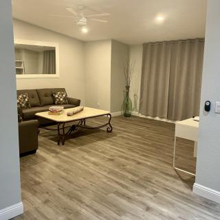 A modern living room with a comfortable sofa and stylish decor.