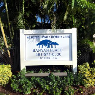 Sign for Banyan Place, an assisted living and memory care facility.