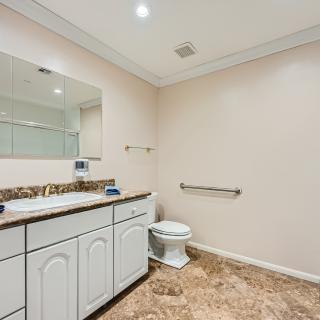 A clean and spacious bathroom with modern fixtures.