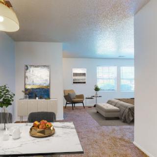 A modern living space showcasing a cozy dining area and a stylish lounge.