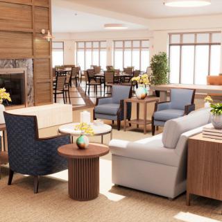 A modern and cozy lounge area with comfortable seating and natural light.