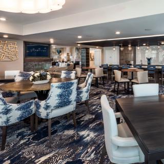 A modern dining area with stylish furniture and elegant decor.