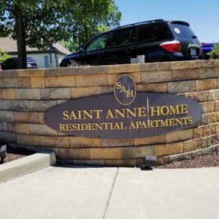 Entrance sign for Saint Anne Home Residential Apartments.