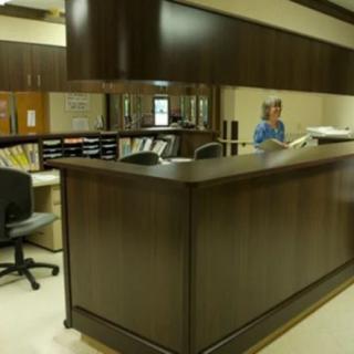A reception desk area in an office or healthcare facility.