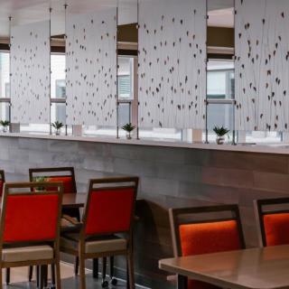 A modern restaurant interior with stylish seating and decor.