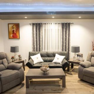 A cozy living room with comfortable sofas and elegant decor.