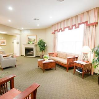 A cozy living room with comfortable seating and warm decor.