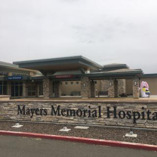 Exterior view of Mayers Memorial Hospital, showcasing its modern architecture and signage.