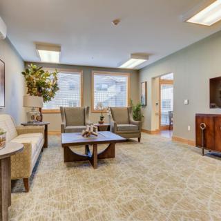 A cozy and modern living room with comfortable seating and stylish furnishings.