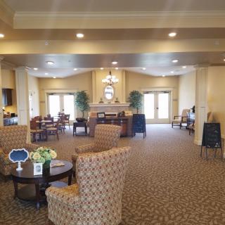 A cozy lobby area with comfortable seating and elegant decor.