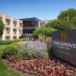 The Grove Parkside entrance surrounded by landscaped gardens.