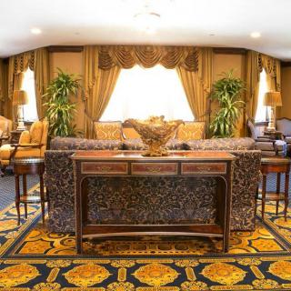 A luxurious living room adorned with elegant furniture and decor.