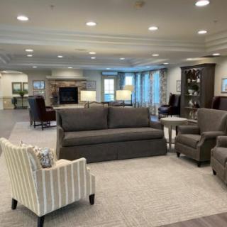 A spacious and cozy living room with comfortable seating arrangements.